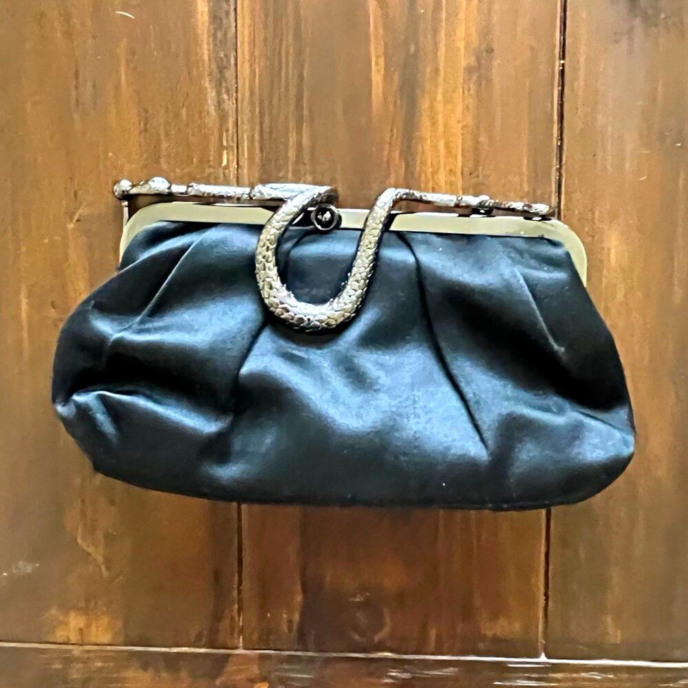 BCBGMAXAZRIA Women’s Black Clutch with Decorative Snake Accent